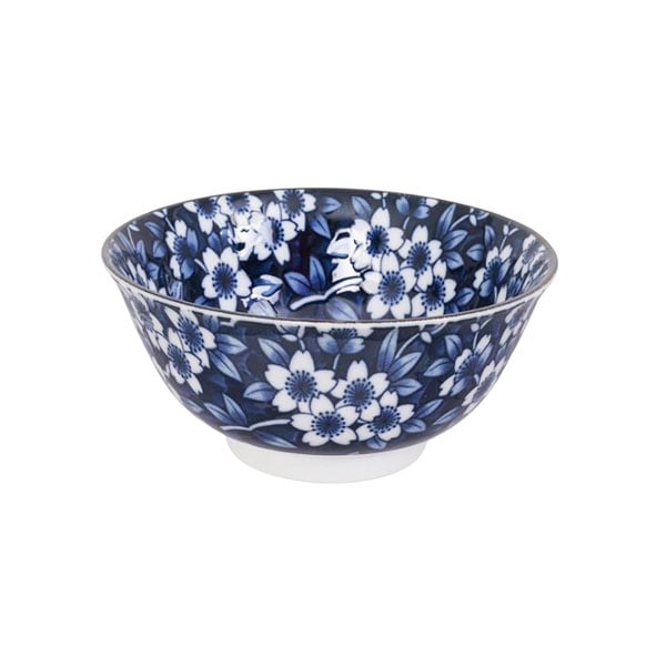 Ciotola in ceramica blu con fiori bianchi